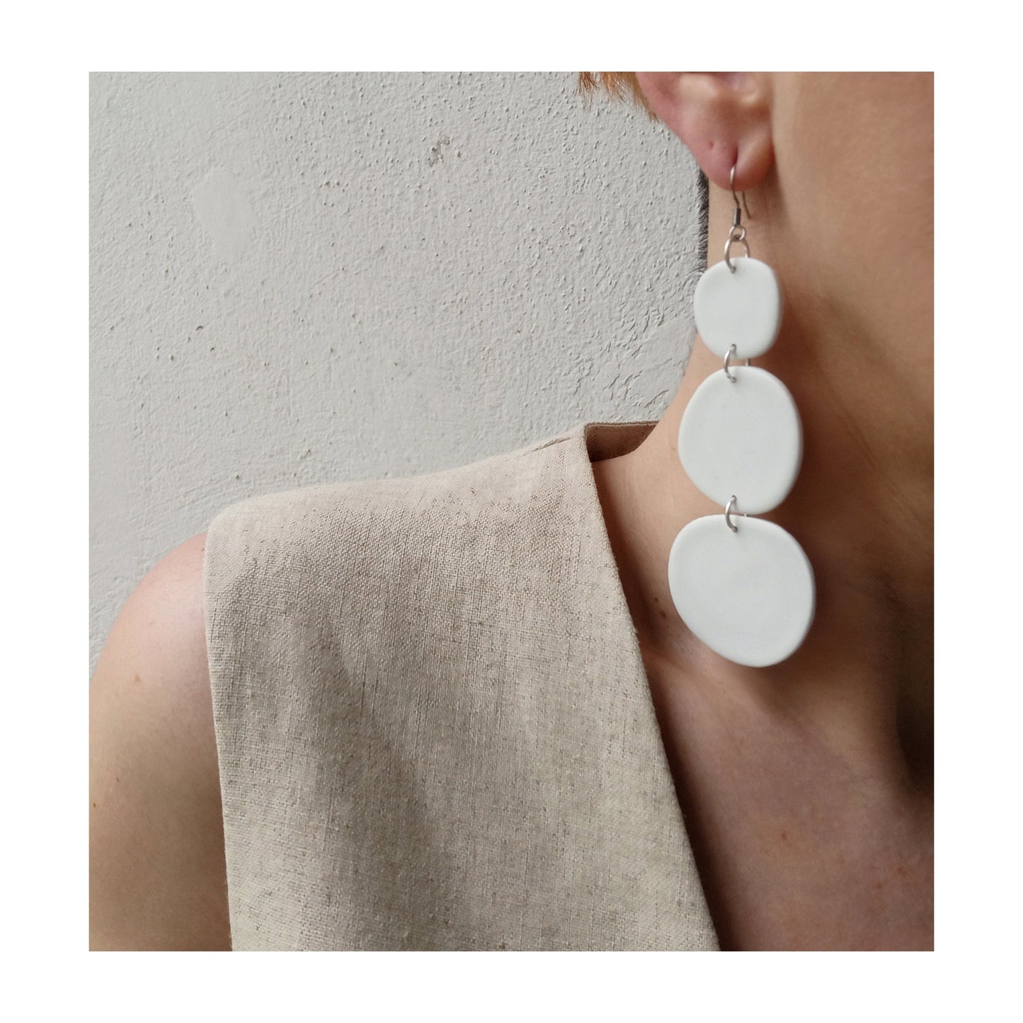 PEBBLES white long earrings